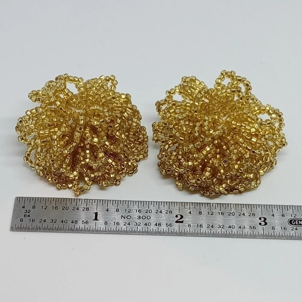* vintage gold tone glass seed beads flower puff dramatic clip on earrings